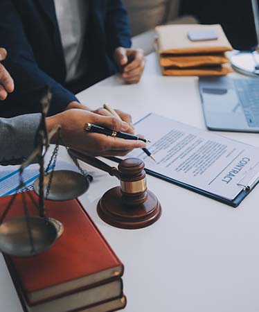 consultation-conference-male-lawyers-professional-businesswoman-working-discussion-having-law-firm-office-concepts-law-judge-gavel-with-scales-justice