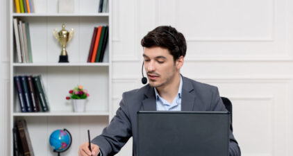 customer-service-handsome-man-grey-suit-with-computer-headset-taking-down-notes Get into your dream Law School with our Online Crash Course, where learning knows no limits.